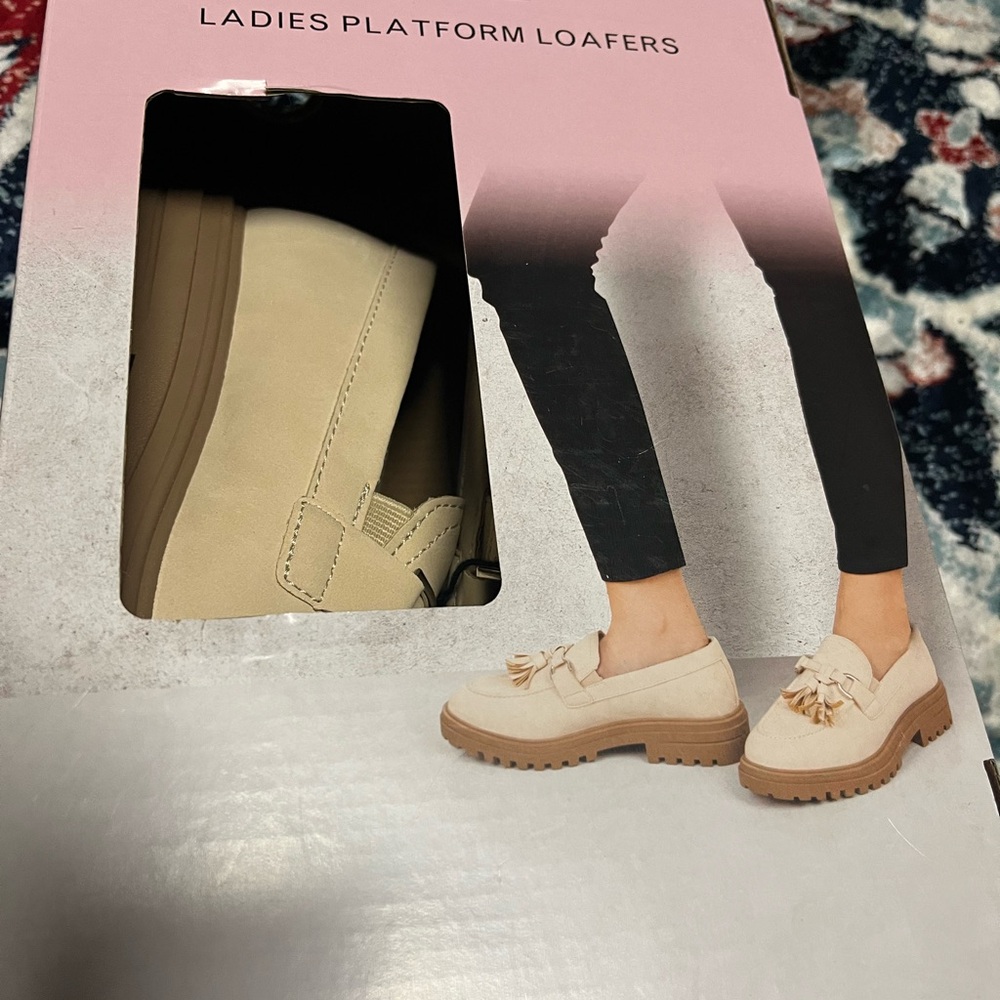 New beige cream Loafers with Tassel Detail. Says size 6 but fits like a 6.5.